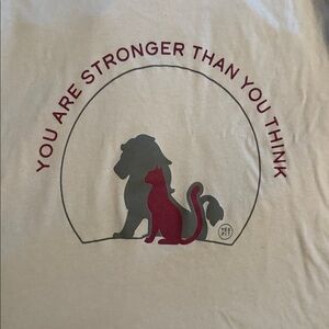 Motivational Cream Tee with Lion and Cat Graphic